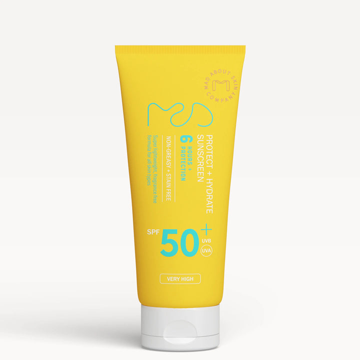 Yellow sunscreen tube with SPF 50 on a white background