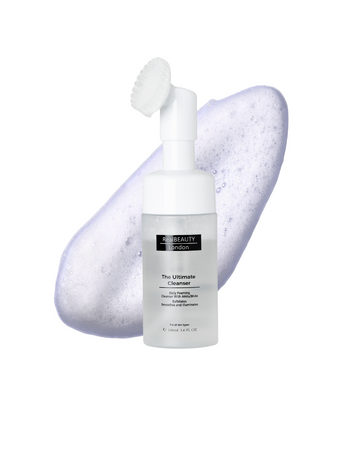 Skincare bottle labeled 'The Ultimate Cleanser' with a foam applicator on a white background