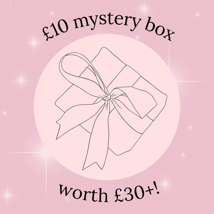 Pink background with a line drawing of a gift box and text about a mystery box offer.