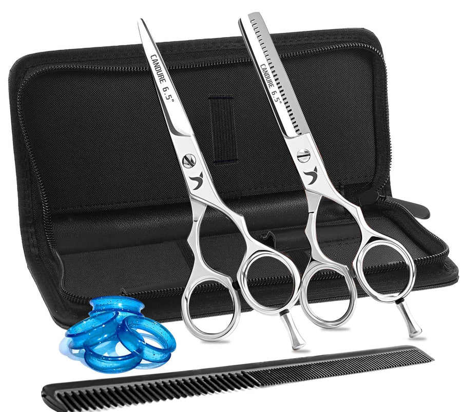 Set of grooming scissors with a black case on a white background