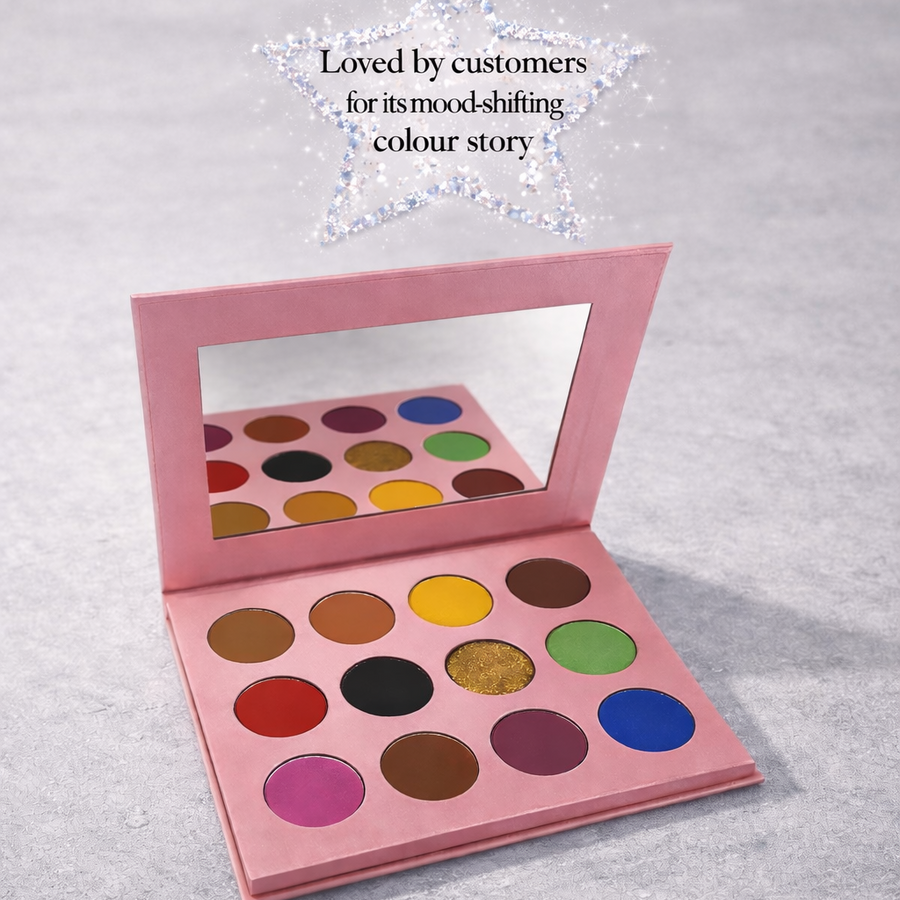 Makeup palette with colorful shades on a light gray background