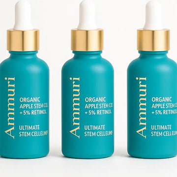 Three Ammuri skincare dropper bottles on a white background