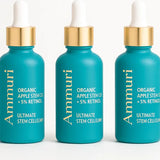 Three Ammuri skincare dropper bottles on a white background