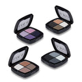 Four open eye shadow palettes with visible color swatches on a white background