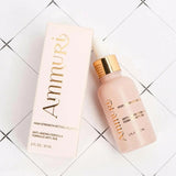 Ammuri skincare product bottle and box on a white tiled background