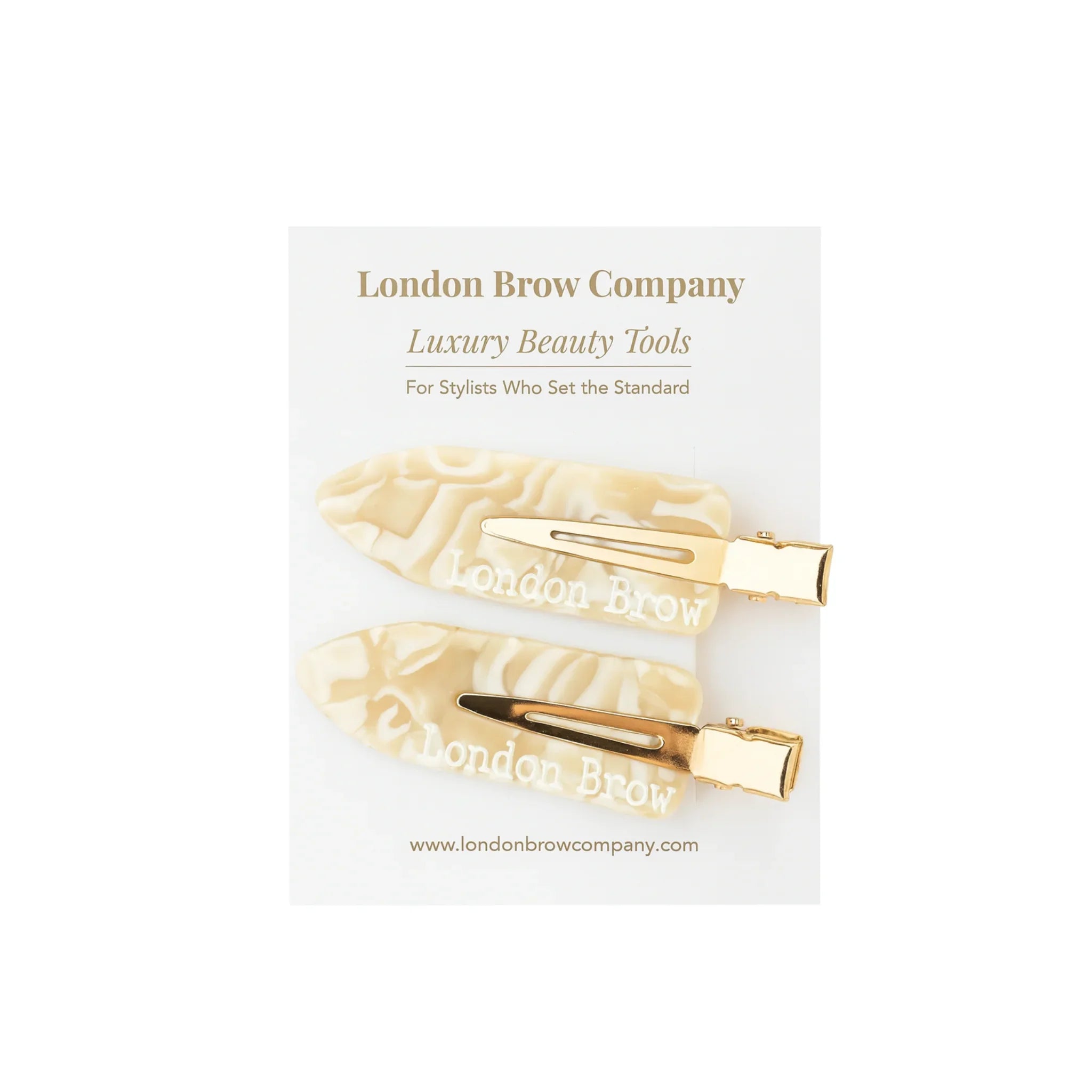 Packaging of 'London Brow' beauty tools on a white background