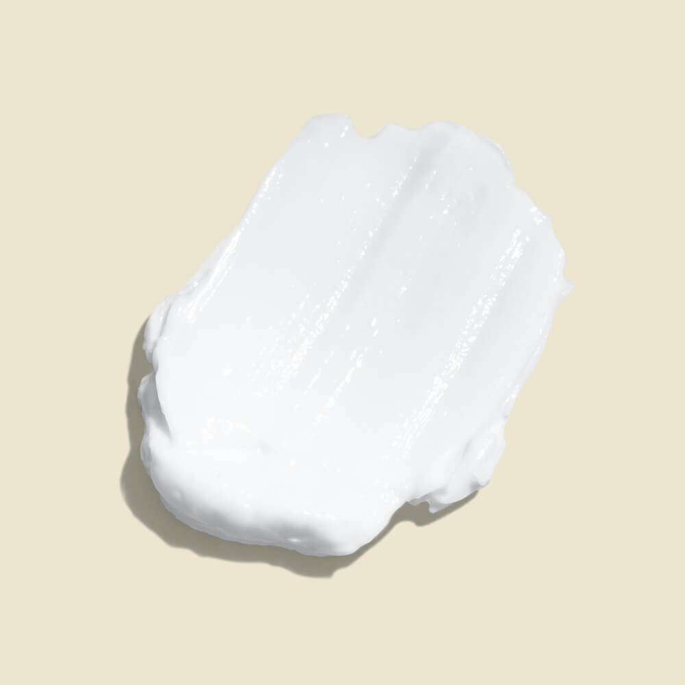 Highborn Night Elixir moisturising night cream jar with open lid on white background