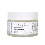 Jar of Balmista waterless face cream on a white background