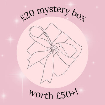 Mystery box promotion with a pink background and a bow illustration.