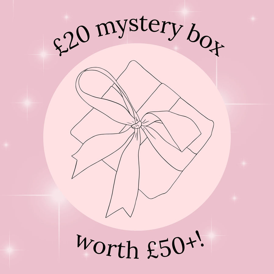 Mystery box promotion with a pink background and a bow illustration.