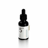 Black dropper bottle with white label on a white background