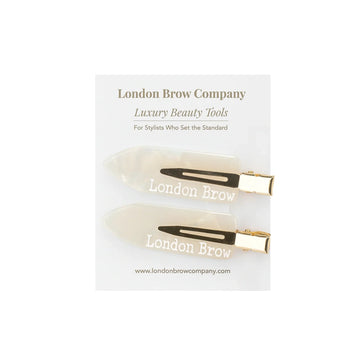 Packaging of 'London Brow' beauty tools on a white background