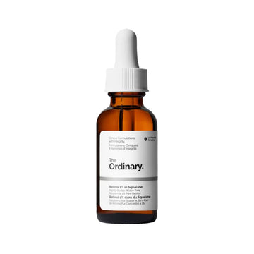 Brown glass bottle with white cap labeled 'The Ordinary' on a white background