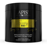 Black container of APIS Sunny Rio smoothing scrub with gold accents on a white background