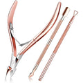 Set of rose gold nail care tools on a white background