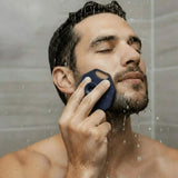 Man using ScrubMeFace Breathtaking Blue facial cleansing brush