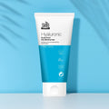 SF Hyaluronic Superfood Day Moisturiser 60ml tube on blue background, showcasing its hydrating formula.