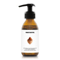 Bottle of Ministerstwo skincare product on a white background